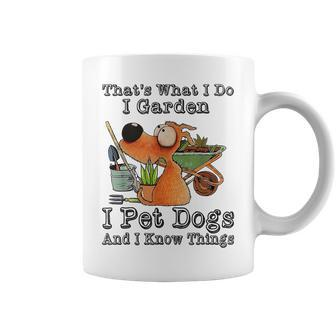 That's What I Do I Garden I Pet Dogs And I Know Things Coffee Mug - Seseable