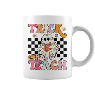 Trick Or Teach Groovy Halloween Retro Floral Ghost Teacher Coffee Mug | Mazezy