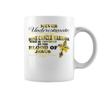 Never Underestimate Bone Cancer Warrior Covered Blood Jesus Coffee Mug | Mazezy
