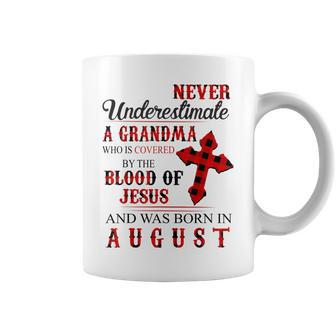 Never Underestimate A Grandma Who Is Covered Jesus In August Coffee Mug | Mazezy