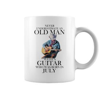 Never Underestimate July Man With A Guitar Coffee Mug | Mazezy