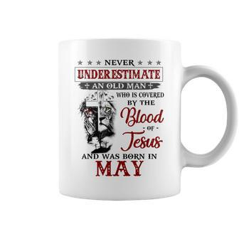 Never Underestimate A May Man Covered By Blood Of Jesus Coffee Mug - Seseable