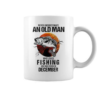 Never Underestimate An Old December Man Who Loves Fishing Coffee Mug | Mazezy