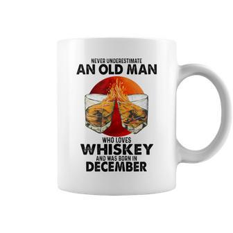 Never Underestimate An Old December Man Who Loves Whiskey Coffee Mug - Seseable