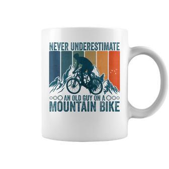 Never Underestimate An Old Guy On A Mountain Bike Cycling Coffee Mug - Monsterry DE