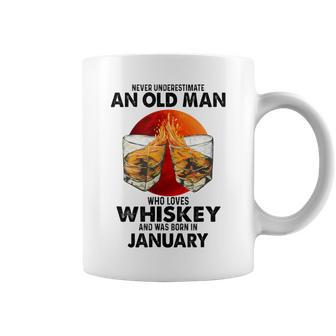 Never Underestimate An Old January Man Who Loves Whiskey Coffee Mug - Seseable