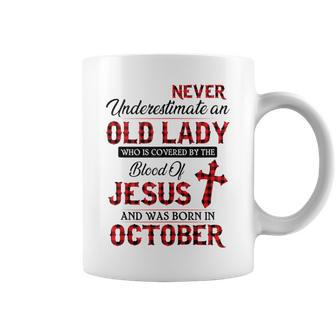 Never Underestimate An Old Lady Who Is Covered By-October Coffee Mug | Mazezy