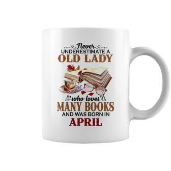 Never Underestimate A Old Lady Who Loves Many Books April Coffee Mug | Mazezy