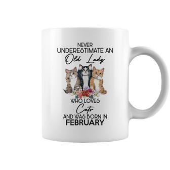 Never Underestimate An Old Lady Who Loves Cats February Coffee Mug | Mazezy