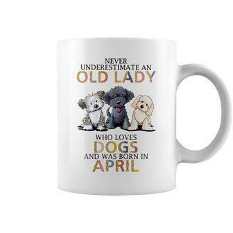 Never Underestimate Old Lady Loves Dogs Born In April Coffee Mug - Seseable