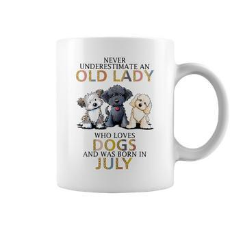 Never Underestimate Old Lady Loves Dogs Born In July Coffee Mug - Seseable