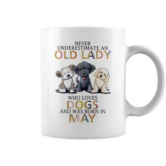 Never Underestimate Old Lady Loves Dogs Born In May Coffee Mug - Seseable