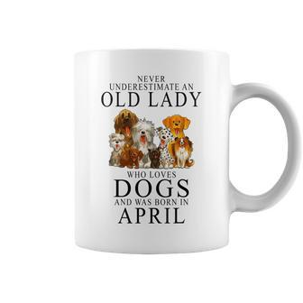 Never Underestimate An Old Lady Who Loves Dogs Coffee Mug - Thegiftio UK