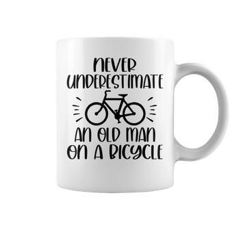 Never Underestimate Old Man On Bicycle Cyclist Cycling Coffee Mug | Mazezy