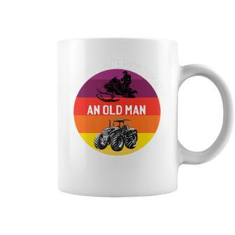 Never Underestimate An Old Man With A Snowmobile Tractor Coffee Mug - Seseable