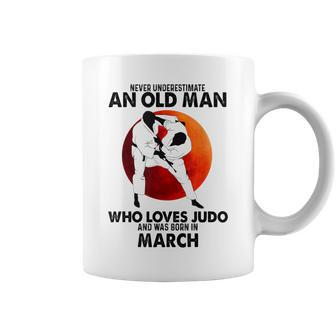 Never Underestimate An Old March Man Who Loves Judo Coffee Mug - Seseable