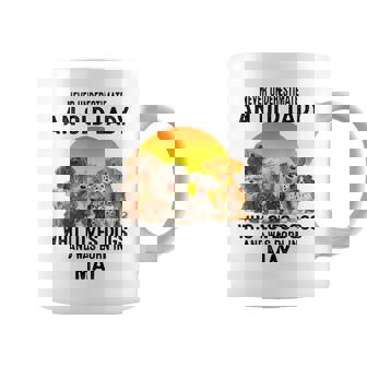 Never Underestimate An Old May Lady Who Loves Dogs Coffee Mug - Seseable