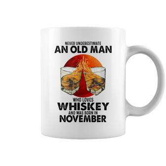 Never Underestimate An Old November Man Who Loves Whiskey Coffee Mug - Seseable