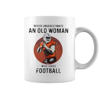 Never Underestimate An Old Woman Who Loves Football Coffee Mug - Monsterry