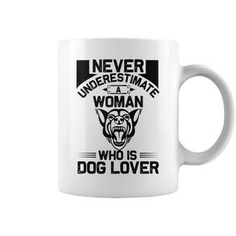 Never Underestimate A Woman Who Is A Dog Lover Dog Coffee Mug - Seseable
