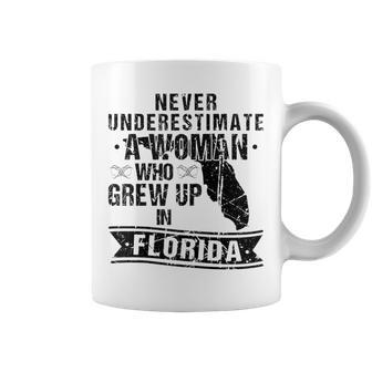 Never Underestimate A Woman Who Grew Up In Florida Coffee Mug | Mazezy