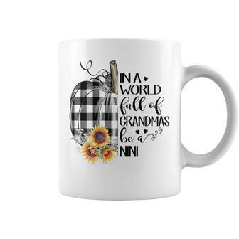 In A World Full Of Grandmas Be A Nini Halloween Fall Coffee Mug | Mazezy