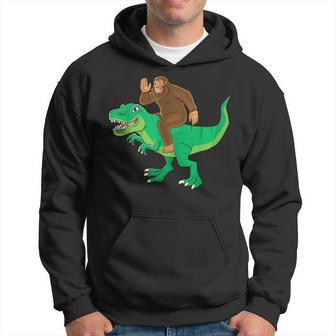 Bigfoot Riding Dinosaur T Rex Funny Men Boys Sasquatch Lover Hoodie - Seseable