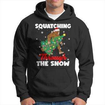 Bigfoot Squatching Through The Snow Sasquatch Christmas Xmas Hoodie - Thegiftio UK