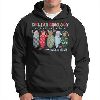 Delivering Joy One Baby At A Time Labor Delivery Christmas Hoodie - Monsterry DE