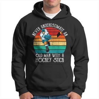 Funny Men Never Underestimate An Old Man With A Hockey Stick Hoodie - Seseable