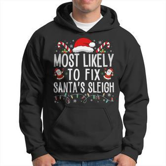 Most Likely To Fix Santa Sleigh Christmas Believe Santa Hoodie - Thegiftio UK