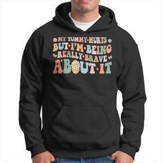 My Tummy Hurts But Im Being Really Brave About It Groovy Hoodie | Mazezy