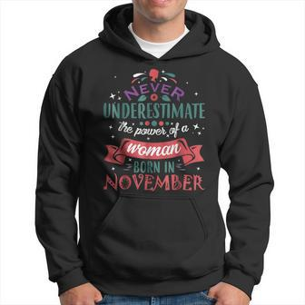 Never Underestimate A Woman Born In November Hoodie - Seseable