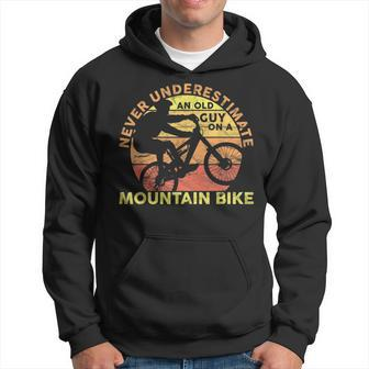 Never Underestimate An Old Guy On A Mountain Bike Cycling Gift For Mens Hoodie | Mazezy