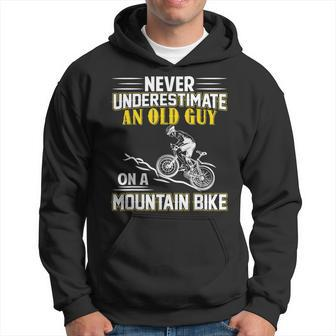Never Underestimate An Old Guy On A Mountain Bike Gift For Mens Hoodie - Seseable