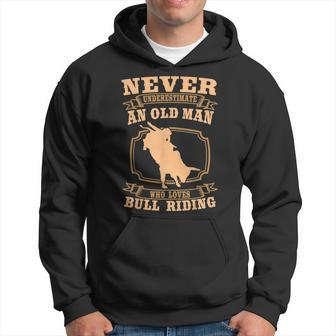 Never Underestimate An Old Man Bull Riding Rodeo Sport Old Man Funny Gifts Hoodie | Mazezy