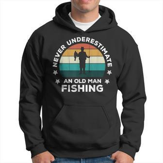 Never Underestimate An Old Man Fishing Fun Catching Fish Hoodie - Seseable