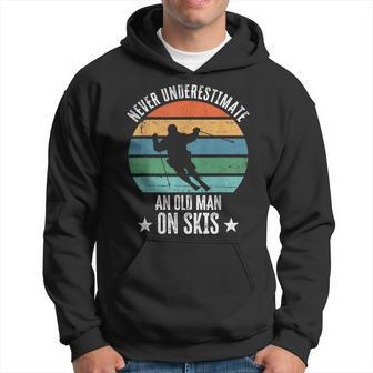 Never Underestimate An Old Man On Skis Funny Skier Gift Gift For Mens Hoodie | Mazezy