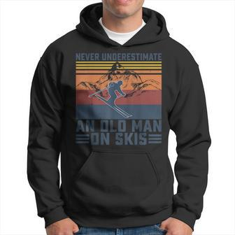 Never Underestimate An Old Man On Skis Funny Skiing Lover Old Man Funny Gifts Hoodie | Mazezy