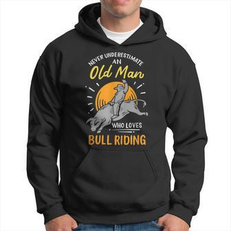 Never Underestimate An Old Man Who Loves Bull Riding Gift For Mens Hoodie - Seseable