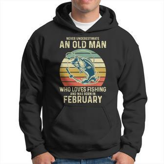 Never Underestimate An Old Man Who Loves Fishing February Hoodie - Seseable