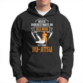 Never Underestimate An Old Man Who Trains Jiujitsu Gift For Mens Hoodie - Seseable