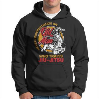 Never Underestimate An Old Man Who Trains Jiujitsu Old Man Funny Gifts Hoodie | Mazezy