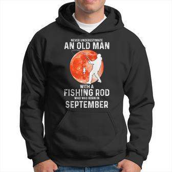 Never Underestimate An Old Man With A Fishing Rod September Hoodie - Seseable