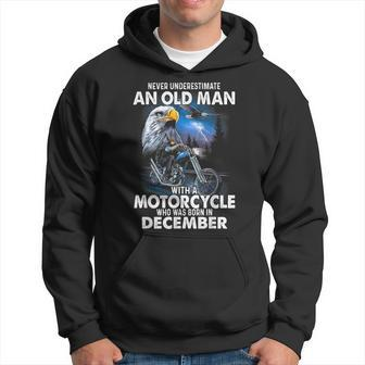 Never Underestimate An Old Man With A Motorcycle December Hoodie - Seseable