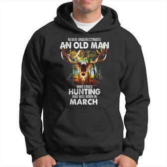 Never Underestimate An Old March Man Who Loves Hunting Hoodie - Seseable