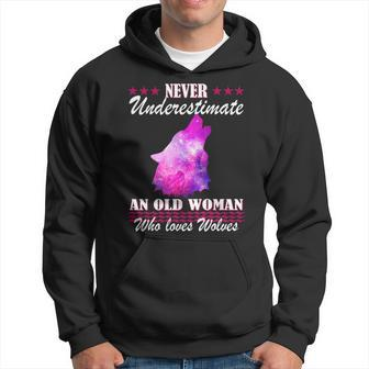 Never Underestimate An Old Woman Who Loves Wolves Gift Wolf Old Woman Funny Gifts Hoodie | Mazezy