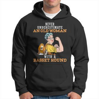 Never Underestimate An Old Woman With Basset Hound Old Woman Funny Gifts Hoodie | Mazezy