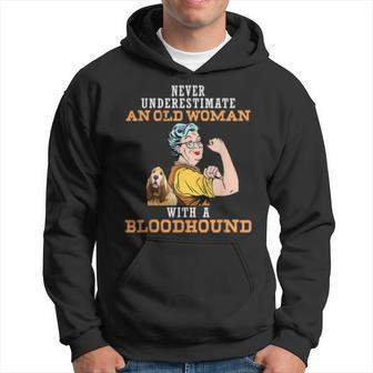 Never Underestimate An Old Woman With Bloodhound Dog Old Woman Funny Gifts Hoodie | Mazezy