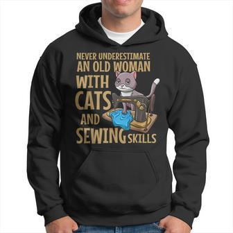 Never Underestimate An Old Woman With Cats And Sewing Skills Old Woman Funny Gifts Hoodie | Mazezy